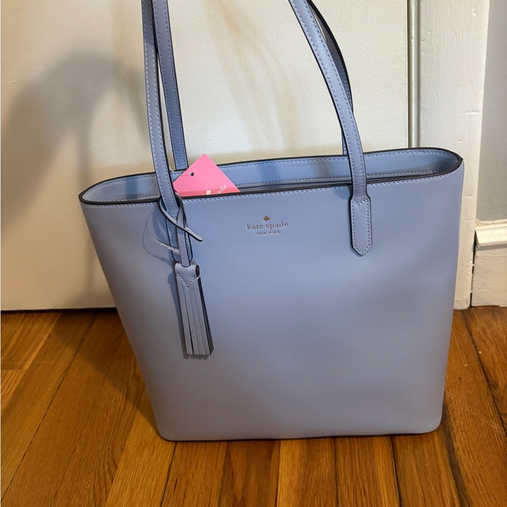 NWT Kate spade bag in a periwinkle color